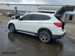 2017 BMW X1 xDrive28i with VIN WBXHT3C31H5F85452, listed as a Copart auction lot 50351125 with 61,954 mi miles and Salvage Title. Bid and sale history available at carsss.com. Image 2.