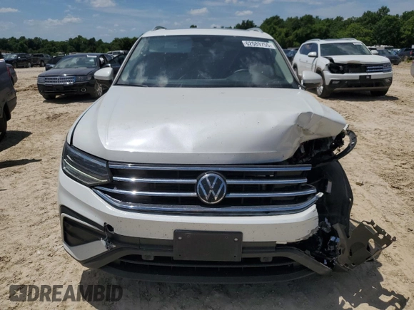 2023 Volkswagen Tiguan SE с VIN 3VVNB7AX0PM120846, выставлен на аукционе Copart как лот 62089755 с пробегом 30 452 миль миль и Списание • Salvage title. История ставок и продаж доступна на DreamBid. Изображение 5.