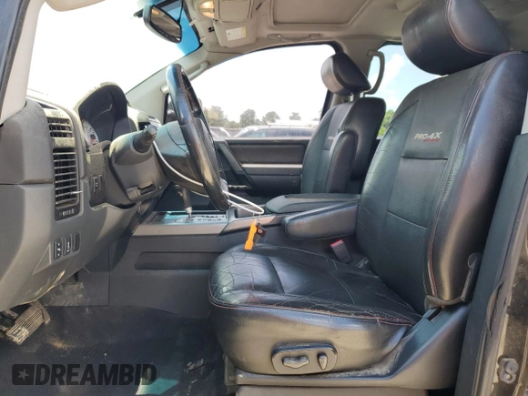 2011 Nissan Titan Pro-4X with VIN 1N6BA0EC6BN313680, listed as a Copart auction lot 60335995 with 241,301 mi miles and Salvage title. Bid and sale history available at DreamBid. Image 7.