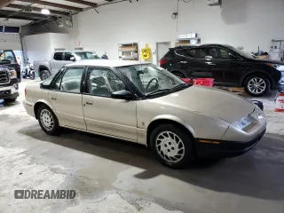 1995 Saturn SL with VIN 1G8ZK5271SZ238117, listed as a Copart auction lot 83723624 with 80,535 mi miles and Clean title. Bid and sale history available at DreamBid. Image 4.