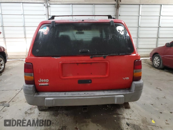 1997 Jeep Grand Cherokee Laredo with VIN 1J4GZ58Y9VC629994, listed as a Copart auction lot 83086694 with 252,147 mi miles and Salvage Title. Bid and sale history available at carsss.com. Image 6.