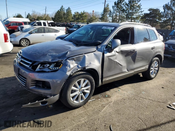 2012 Volkswagen Touareg Lux z VIN WVGEK9BPXCD011322, wystawiony jako Copart lot #87062254 z przebiegiem 110 985 mil mil oraz Szkoda całkowita • Salvage title. Historia ofert i sprzedaży dostępna na DreamBid. Obrazek 1.