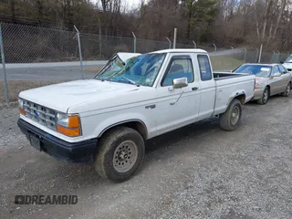 1991 Ford Ranger with VIN 1FTCR15T0MTA27957, listed as a IAAI auction lot 41723354 with 29,501 mi miles. Bid and sale history available at carsss.com. Image 2.