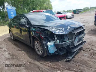 2020 Ford Fusion SE z VIN 3FA6P0HD3LR154127, wystawiony jako IAAI lot #42528631 z przebiegiem 88 920 mil mil oraz . Historia ofert i sprzedaży dostępna na DreamBid. Obrazek 1.