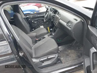 2018 Volkswagen Tiguan S with VIN 3VV1B7AX1JM076071, listed as a IAAI auction lot 42043311 with 107,883 mi miles and . Bid and sale history available at DreamBid. Image 5.