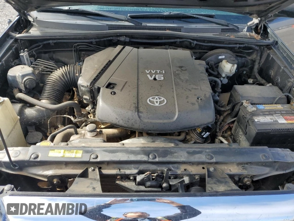2013 Toyota Tacoma z VIN 3TMLU4EN0DM129808, wystawiony jako Copart lot #50353125 z przebiegiem 231 750 mil mil oraz Szkoda całkowita • Salvage title. Historia ofert i sprzedaży dostępna na DreamBid. Obrazek 11.