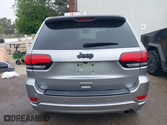 2017 Jeep Grand Cherokee Laredo with VIN 1C4RJEAG0HC702195, listed as a IAAI auction lot 42427597 with 104,403 mi miles and . Bid and sale history available at DreamBid. Image 17.