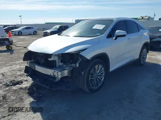 2020 Lexus RX with VIN 2T2JZMAA5LC165525, listed as a IAAI auction lot 41396533 with 67,440 mi miles. Bid and sale history available at carsss.com. Image 2.