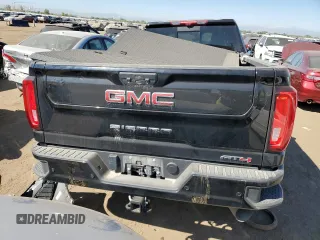 2023 GMC Sierra 3500HD AT4 z VIN 1GT49VEY1PF260918, wystawiony jako Copart lot #72765654 z przebiegiem 13 596 mil mil oraz Szkoda całkowita • Salvage title. Historia ofert i sprzedaży dostępna na DreamBid. Obrazek 6.