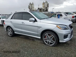 2015 Mercedes-Benz M 63 AMG with VIN 4JGDA7EB7FA504173, listed as a Copart auction lot 47596605 with 114,001 mi miles and Salvage Title. Bid and sale history available at carsss.com. Image 4.