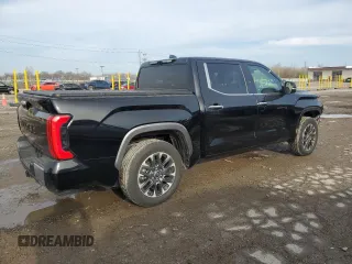 2023 Toyota Tundra Limited with VIN 5TFJA5DB9PX069197, listed as a Copart auction lot 52006175 with 7,396 mi miles and Salvage title. Bid and sale history available at DreamBid. Image 3.