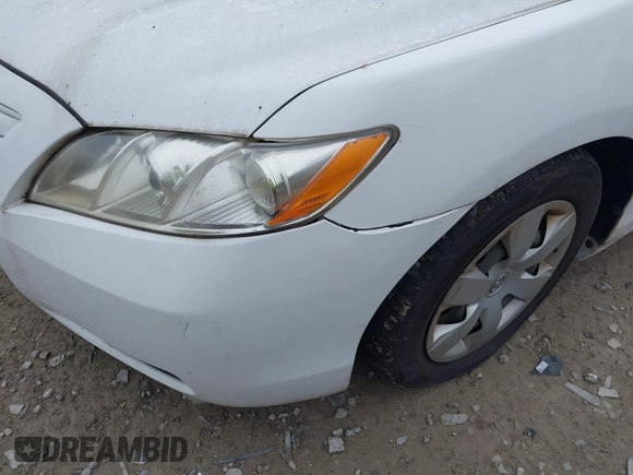 2007 Toyota Camry CE z VIN 4T1BE46K97U640376, wystawiony jako IAAI lot #42374162 z przebiegiem 251 260 mil mil oraz . Historia ofert i sprzedaży dostępna na DreamBid. Obrazek 6.