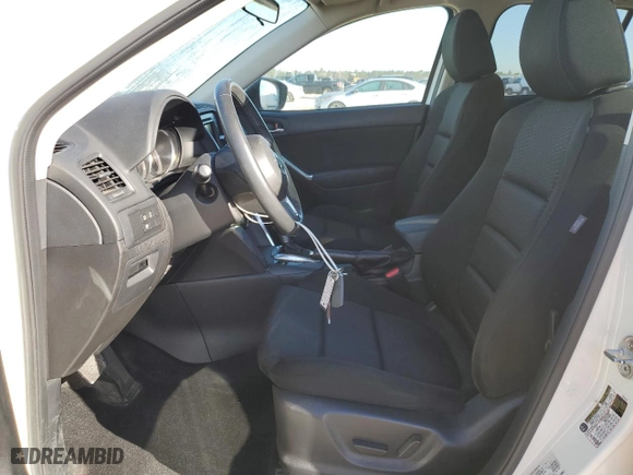 2015 Mazda CX-5 Touring with VIN JM3KE2CY8F0541885, listed as a Copart auction lot 48375445 with 104,479 mi miles and Salvage Title. Bid and sale history available at carsss.com. Image 7.
