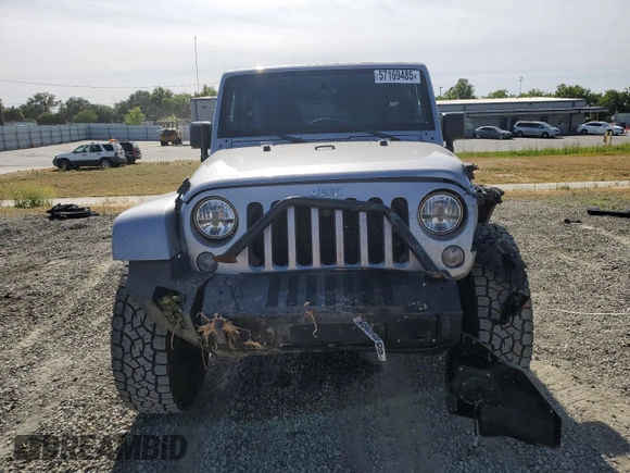2014 Jeep Wrangler Unlimited Sahara with VIN 1C4HJWEG1EL126611, listed as a Copart auction lot 57169485 with 122,000 mi miles and Salvage title. Bid and sale history available at DreamBid. Image 5.