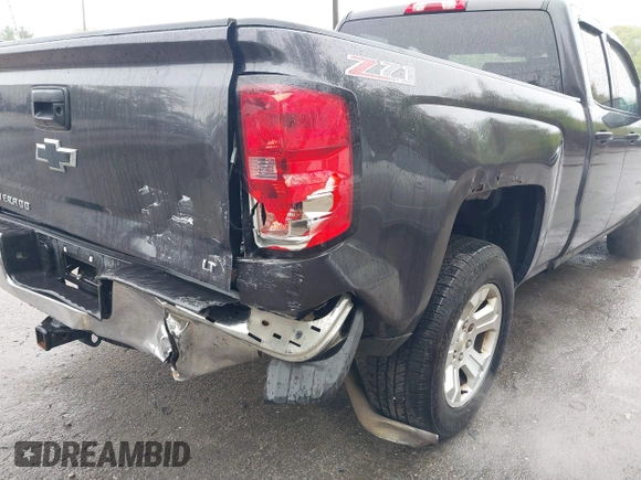 2014 Chevrolet Silverado 1500 LT with VIN 1GCVKREC0EZ181238, listed as a IAAI auction lot 42155213 with 171,893 mi miles and . Bid and sale history available at DreamBid. Image 6.