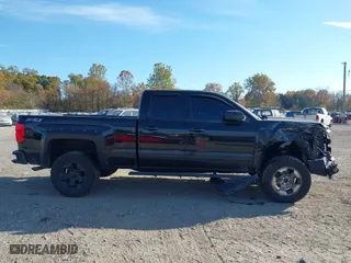 2017 Chevrolet Silverado 1500 LT with VIN 1GCVKREC0HZ293560, listed as a IAAI auction lot 40706331 with 133,438 mi miles. Bid and sale history available at carsss.com. Image 13.