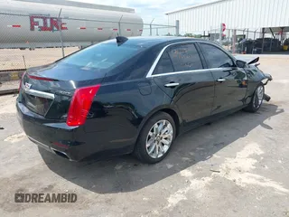 2016 Cadillac CTS AWD with VIN 1G6AW5SX7G0129019, listed as a IAAI auction lot 42148335 with 86,023 mi miles and . Bid and sale history available at DreamBid. Image 4.