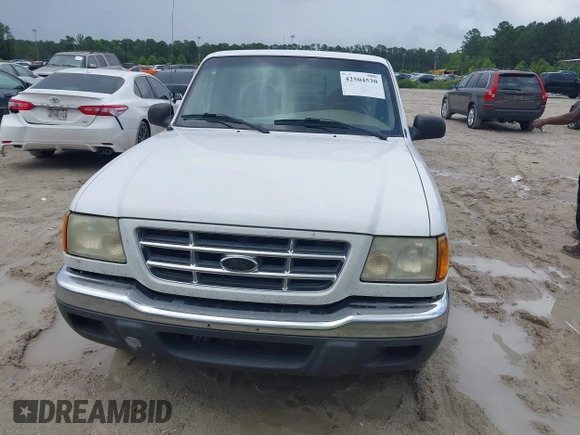 2003 Ford Ranger XL Fleet z VIN 1FTYR44V23TA10053, wystawiony jako IAAI lot #42504530 z przebiegiem 152 733 mil mil oraz . Historia ofert i sprzedaży dostępna na DreamBid. Obrazek 6.