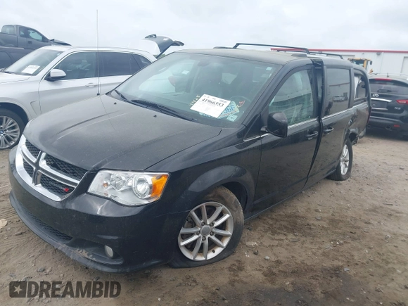 2018 Dodge Grand Caravan SXT with VIN 2C4RDGCGXJR283091, listed as a IAAI auction lot 41966553 with 102,309 mi miles and . Bid and sale history available at DreamBid. Image 17.