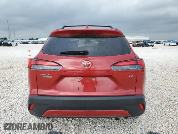2022 Toyota Corolla Cross XLE with VIN 7MUDAAAG7NV019610, listed as a Copart auction lot 55146165 with 13,633 mi miles and Salvage title. Bid and sale history available at DreamBid. Image 6.