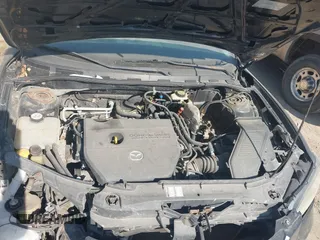 2006 Mazda 3 i Touring with VIN JM1BK32F361455126, listed as a IAAI auction lot 41777285 with 143,499 mi miles and . Bid and sale history available at DreamBid. Image 10.