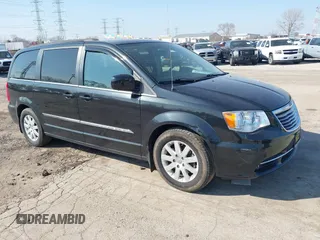2015 Chrysler Town & Country Touring with VIN 2C4RC1BG0FR672993, listed as a IAAI auction lot 41797935 with 116,815 mi miles. Bid and sale history available at carsss.com. Image 1.