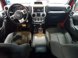 2018 Jeep Wrangler JK Unlimited Sport S with VIN 1C4BJWDG4JL895945, listed as a Copart auction lot 79836184 with 81,287 mi miles and Salvage Title. Bid and sale history available at carsss.com. Image 8.