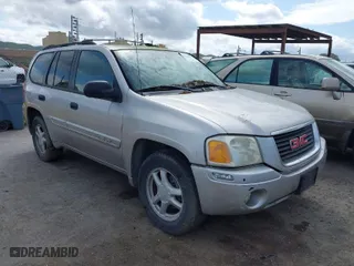 2004 GMC Envoy SLE with VIN 1GKDT13S842353029, listed as a IAAI auction lot 41938513 with 210,990 mi miles. Bid and sale history available at carsss.com. Image 1.