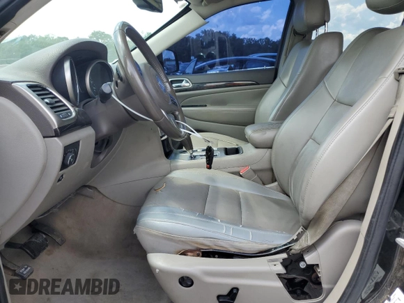 2011 Jeep Grand Cherokee Laredo with VIN 1J4RR4GG6BC538074, listed as a Copart auction lot 60231465 with 203,942 mi miles and Salvage title. Bid and sale history available at DreamBid. Image 7.