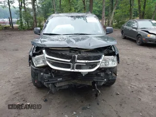 2018 Dodge Journey SXT z VIN 3C4PDCBB7JT409958, wystawiony jako IAAI lot #42200397 z przebiegiem 146 306 mil mil oraz . Historia ofert i sprzedaży dostępna na DreamBid. Obrazek 13.