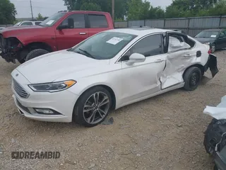 2017 Ford Fusion Titanium with VIN 3FA6P0D96HR239830, listed as a IAAI auction lot 42741998 with 116,951 mi miles and . Bid and sale history available at DreamBid. Image 2.