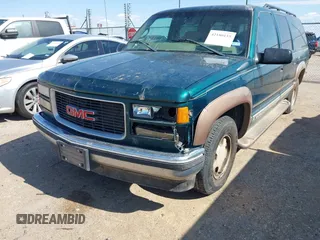 1998 GMC Suburban z VIN 3GKEC16R2WG509363, wystawiony jako IAAI lot #42180155 z przebiegiem 191 066 mil mil oraz . Historia ofert i sprzedaży dostępna na DreamBid. Obrazek 6.