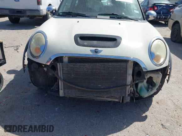 2007 MINI Hardtop S with VIN WMWMF73527TT82098, listed as a IAAI auction lot 41828664 with 107,418 mi miles and . Bid and sale history available at DreamBid. Image 6.