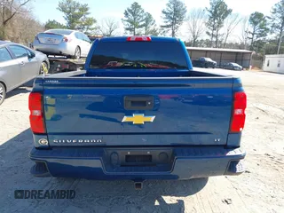 2018 Chevrolet Silverado 1500 LT with VIN 3GCUKREC9JG211391, listed as a IAAI auction lot 41710886 with 113,989 mi miles. Bid and sale history available at carsss.com. Image 16.