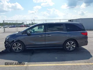 2022 Honda Odyssey Touring с VIN 5FNRL6H86NB026316, выставлен на аукционе IAAI как лот 42611106 с пробегом 75 427 миль миль и . История ставок и продаж доступна на DreamBid. Изображение 14.