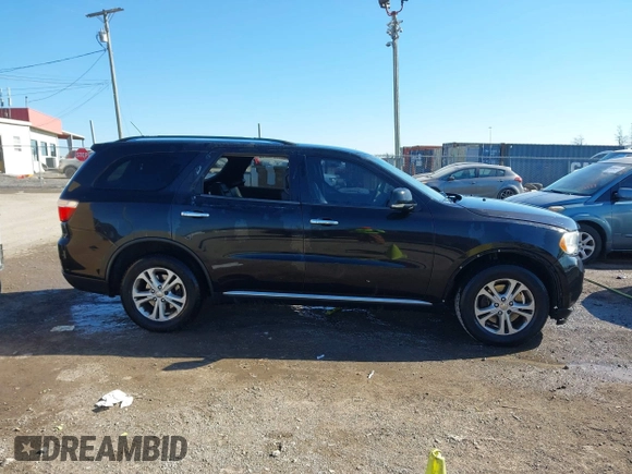 2013 Dodge Durango Crew with VIN 1C4SDHDT3DC553939, listed as a IAAI auction lot 41404491 with 148,505 mi miles and . Bid and sale history available at carsss.com. Image 13.