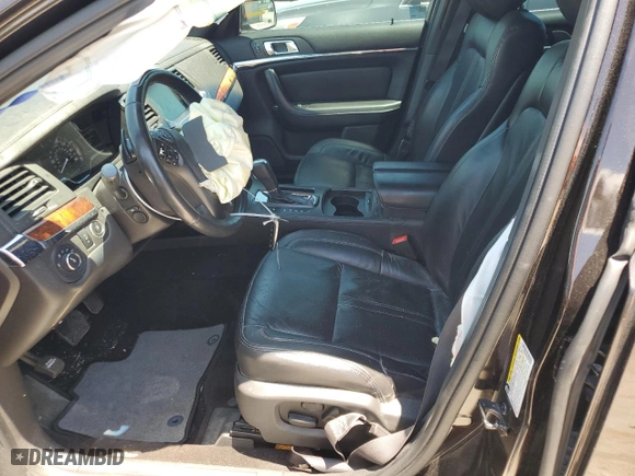2013 Lincoln MKS with VIN 1LNHL9DK0DG615859, listed as a Copart auction lot 66994754 with 105,133 mi miles and Salvage Title. Bid and sale history available at carsss.com. Image 7.