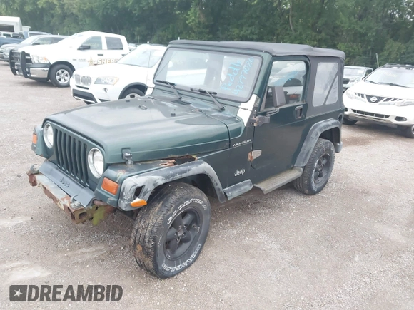 1999 Jeep Wrangler SE z VIN 1J4FY29P7XP479351, wystawiony jako IAAI lot #42797020 z przebiegiem 171 598 mil mil oraz . Historia ofert i sprzedaży dostępna na DreamBid. Obrazek 2.