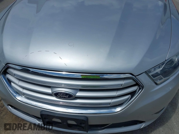 2013 Ford Taurus Limited with VIN 1FAHP2F8XDG117448, listed as a IAAI auction lot 39585596 with 150,747 mi miles and . Bid and sale history available at DreamBid. Image 13.