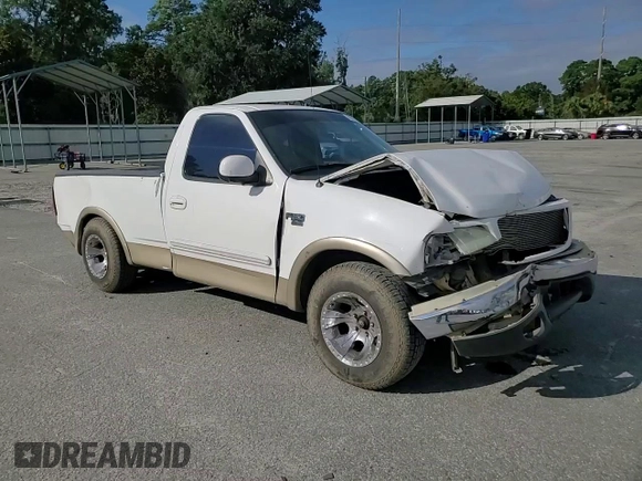 1999 Ford F-150 XL with VIN 1FTRF17L8XNA75702, listed as a Copart auction lot 69868104 with Not provided miles and Salvage title. Bid and sale history available at DreamBid. Image 11.