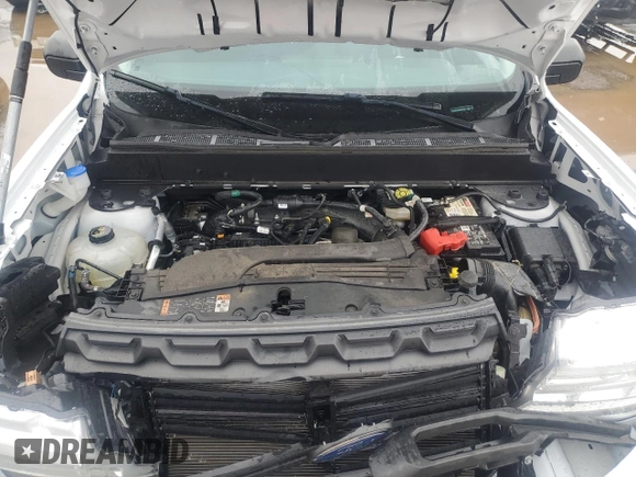 2022 Ford Maverick XL z VIN 3FTTW8F97NRB08378, wystawiony jako Copart lot #56183695 z przebiegiem 23 566 mil mil oraz Szkoda całkowita • Salvage title. Historia ofert i sprzedaży dostępna na DreamBid. Obrazek 11.