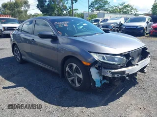 2020 Honda Civic LX z VIN 19XFC2F67LE001375, wystawiony jako IAAI lot #42033879 z przebiegiem 79 941 mil mil oraz . Historia ofert i sprzedaży dostępna na DreamBid. Obrazek 1.