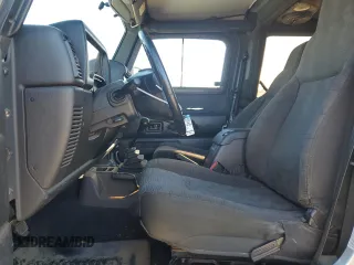2003 Jeep Wrangler Rubicon z VIN 1J4FA69SX3P301962, wystawiony jako Copart lot #79928744 z przebiegiem Nie podano mil oraz Czysty tytuł • Clean title. Historia ofert i sprzedaży dostępna na DreamBid. Obrazek 7.