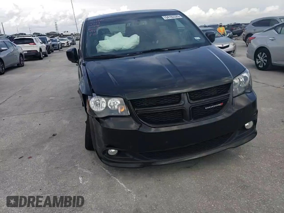 2018 Dodge Grand Caravan SE Plus with VIN 2C4RDGBG2JR199767, listed as a Copart auction lot 54182325 with 137,522 mi miles and Salvage Title. Bid and sale history available at DreamBid. Image 14.
