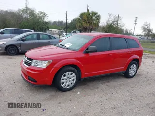 2013 Dodge Journey SE with VIN 3C4PDCAB5DT713666, listed as a IAAI auction lot 41666251 with 198,798 mi miles. Bid and sale history available at carsss.com. Image 2.
