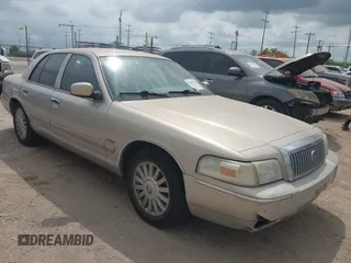 2009 Mercury Grand Marquis LS z VIN 2MEHM75V89X606342, wystawiony jako IAAI lot #42415794 z przebiegiem 103 166 mil mil oraz . Historia ofert i sprzedaży dostępna na DreamBid. Obrazek 1.