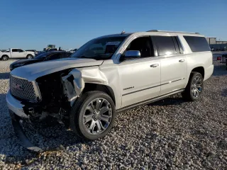 2015 GMC Yukon XL Denali with VIN 1GKS1JKJ7FR176988, listed as a Copart auction lot 47838205 with 0 mi miles and Salvage Title. Bid and sale history available at carsss.com. Image 1.