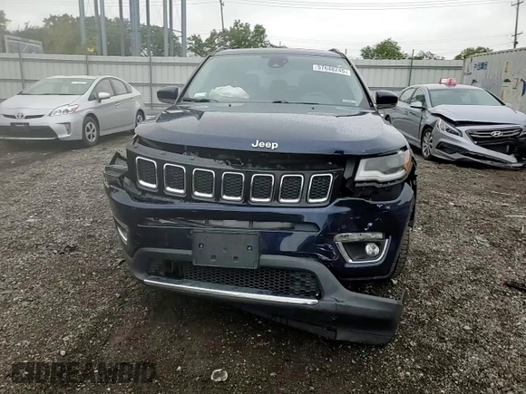 2018 Jeep Compass Limited with VIN 3C4NJDCB4JT128687, listed as a Copart auction lot 57648245 with 136,455 mi miles and Salvage title. Bid and sale history available at DreamBid. Image 14.