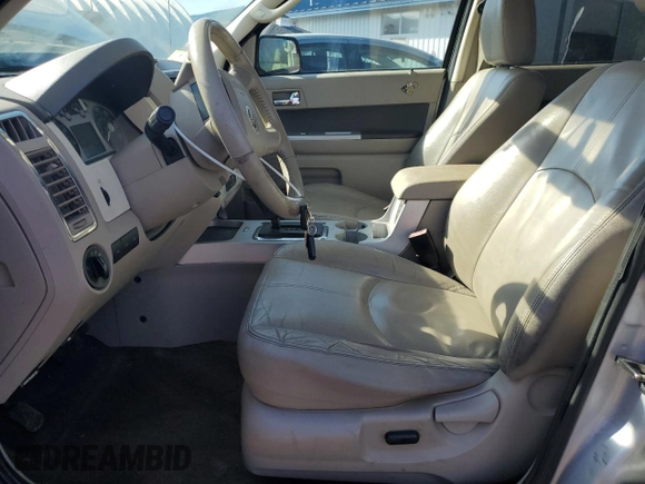 2010 Mercury Mariner с VIN 4M2CN9BG3AKJ24955, выставлен на аукционе Copart как лот 49281755 с пробегом 140 768 миль миль и Списание • Salvage title. История ставок и продаж доступна на DreamBid. Изображение 7.