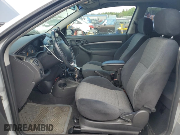 2001 Ford Focus ZX3 z VIN 3FAFP31341R244564, wystawiony jako Copart lot #55472105 z przebiegiem 168 296 mil mil oraz Szkoda całkowita • Salvage title. Historia ofert i sprzedaży dostępna na DreamBid. Obrazek 7.